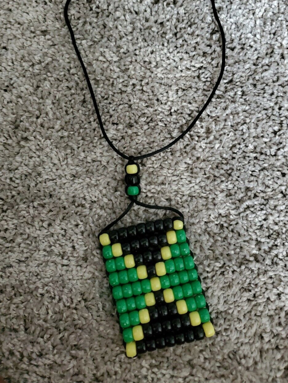 Jamaican Flag. Reggae Girls Beaded Flag 2.5" x 3". Adjustable
